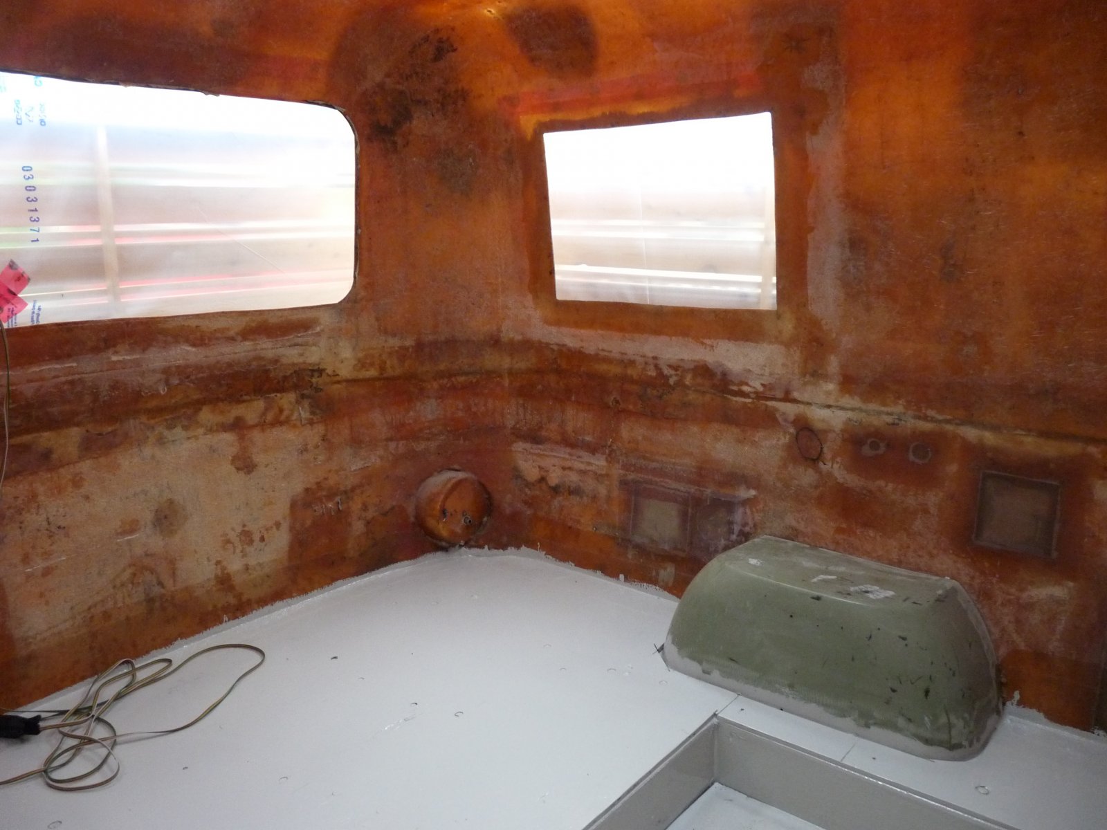 Fiberglass shell repaired with plywood floor